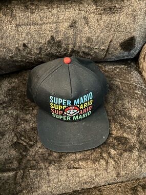 Nintendo Black Hat with Multicolor Super Mario Logo (Blue Trim, Red Strap)